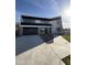 Modern two-story home with clean lines, flat roof, and a spacious driveway leading to an attached garage at 4414 N 29Th St, Phoenix, AZ 85016