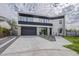 Contemporary two-story home with a spacious driveway and modern landscaping at 4414 N 29Th St, Phoenix, AZ 85016