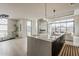 Gourmet kitchen with quartz island, stainless steel appliances, contemporary cabinetry, and seamless integration with living areas at 4414 N 29Th St, Phoenix, AZ 85016