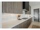 Modern kitchen with stainless steel appliances, quartz countertops, ample storage, and stylish backsplash at 4414 N 29Th St, Phoenix, AZ 85016