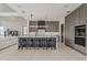 Open-concept kitchen featuring a large island with bar seating, stainless steel appliances, and modern cabinetry at 4414 N 29Th St, Phoenix, AZ 85016
