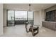 Spacious living room with hardwood floors, comfortable seating, and large windows with scenic views at 4414 N 29Th St, Phoenix, AZ 85016