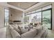 Modern living room design with large windows, fireplace and seamless indoor-outdoor flow at 4414 N 29Th St, Phoenix, AZ 85016