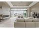 Bright and airy living room with a fireplace, seamlessly blending indoor and outdoor living spaces at 4414 N 29Th St, Phoenix, AZ 85016