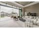 Bright living room featuring an expansive sliding glass door, contemporary furnishings, and access to the patio at 4414 N 29Th St, Phoenix, AZ 85016