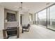 Stylish living room with modern decor, light hardwood floors, and large windows offering panoramic views at 4414 N 29Th St, Phoenix, AZ 85016