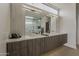 Spa-like bathroom with double vanity, soaking tub, walk-in shower, and modern finishes at 4414 N 29Th St, Phoenix, AZ 85016