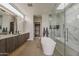 Elegant main bathroom featuring a soaking tub, large shower, and double vanity at 4414 N 29Th St, Phoenix, AZ 85016