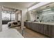 Open concept from bathroom to bedroom. Features double vanity, shower, and soaking tub at 4414 N 29Th St, Phoenix, AZ 85016