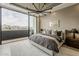 Spacious main bedroom with private balcony overlooking city and mountain views at 4414 N 29Th St, Phoenix, AZ 85016