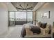 Bright and airy main bedroom boasts stunning views from a private balcony at 4414 N 29Th St, Phoenix, AZ 85016
