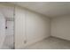 Unfinished bonus room provides space for flexible home uses; features neutral colors and tiled floor at 4414 N 29Th St, Phoenix, AZ 85016