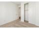 Bedroom featuring neutral carpet, closet and a bright white interior paint at 11624 W Beck Dr, Youngtown, AZ 85363