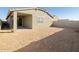 View of the backyard with covered patio and space to create your outdoor oasis at 16005 W Cottontail Ln, Surprise, AZ 85387