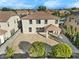 Aerial view of the backyard, showcasing a large patio and beautifully landscaped yard at 3535 E Melody Ln, Gilbert, AZ 85234