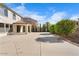 Large backyard with a covered patio, offering ample space for gatherings and outdoor enjoyment at 3535 E Melody Ln, Gilbert, AZ 85234