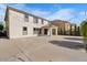 Expansive backyard featuring a large patio and a covered outdoor area, perfect for entertaining at 3535 E Melody Ln, Gilbert, AZ 85234