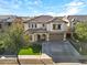 Charming home with a lush lawn, a spacious driveway, and a welcoming front entrance at 3535 E Melody Ln, Gilbert, AZ 85234