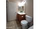 Bathroom with toilet, vanity, and double mirror at 812 W Saint Anne Ave, Phoenix, AZ 85041