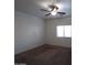 Well-lit bedroom featuring neutral walls and carpet flooring at 812 W Saint Anne Ave, Phoenix, AZ 85041