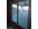 Sliding glass door leading to backyard patio at 812 W Saint Anne Ave, Phoenix, AZ 85041