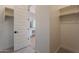 Bright walk-in closet features built-in shelves and hanging space at 18955 W Ocotillo Rd, Waddell, AZ 85355