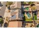 Aerial view highlighting home's solar panels and backyard pool at 20722 N 38Th St, Phoenix, AZ 85050