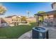 Relaxing covered patio with outdoor dining area, adjacent to the pool at 20722 N 38Th St, Phoenix, AZ 85050