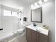 Updated bathroom with a vanity, toilet, and walk-in shower at 20722 N 38Th St, Phoenix, AZ 85050
