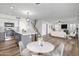 Open floor plan showcasing kitchen island, stainless steel appliances, and spacious living area at 20722 N 38Th St, Phoenix, AZ 85050