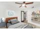 Comfortable bedroom with stylish decor and a ceiling fan at 3033 E Sierra St, Phoenix, AZ 85028
