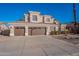 Lovely two-story home with a three-car garage, desert landscaping, and ample parking space at 1663 S Boulder St, Gilbert, AZ 85295