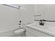Modern bathroom features white subway tiles, a sleek vanity, and stylish fixtures at 4405 N 203Rd Ave, Buckeye, AZ 85396
