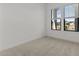 Cozy bedroom with soft carpet, windows and baseboards at 4405 N 203Rd Ave, Buckeye, AZ 85396