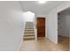 Bright entryway with tiled floor and staircase at 3914 W Ivanhoe St, Chandler, AZ 85226