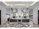 Lavish bathroom with marble accents, dual vanities, decorative lighting, and spacious layout at 4880 E Lone Mountain N Rd, Cave Creek, AZ 85331