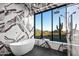 Luxurious bathroom featuring a soaking tub, walk-in shower, and scenic mountain view at 4880 E Lone Mountain N Rd, Cave Creek, AZ 85331