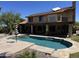 Stunning backyard with a large pool, patio, and desert landscaping providing an ideal outdoor living space at 1201 E Le Marche Ave, Phoenix, AZ 85022