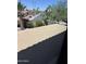 View of neighborhood street, featuring desert landscaping and well-maintained homes in a peaceful setting at 1201 E Le Marche Ave, Phoenix, AZ 85022