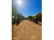 Long driveway leading up to the main house at 7706 N 173Rd Ave, Waddell, AZ 85355