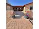 A lovely front entrance has pavers on the walkway and two large potted plants at 7706 N 173Rd Ave, Waddell, AZ 85355