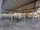 Covered horse pen with metal fencing at 7706 N 173Rd Ave, Waddell, AZ 85355