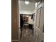 Walk-in closet with custom shelves and storage for shoes and bags at 7706 N 173Rd Ave, Waddell, AZ 85355
