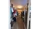 Walk-in closet with custom shelves and ample storage space at 7706 N 173Rd Ave, Waddell, AZ 85355