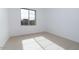 Well-lit bedroom featuring a window with natural light at 876 W Golden Ore Pass, Apache Junction, AZ 85120