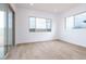 Bright bedroom with tile flooring and multiple windows at 876 W Golden Ore Pass, Apache Junction, AZ 85120