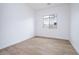 Bright bedroom with tile flooring and a window at 876 W Golden Ore Pass, Apache Junction, AZ 85120