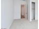 Spacious bedroom with carpeted floor and ample closet space at 876 W Golden Ore Pass, Apache Junction, AZ 85120