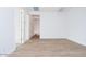 Bright hallway with tile flooring and doors to other rooms at 876 W Golden Ore Pass, Apache Junction, AZ 85120