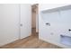 Laundry room with built-in shelving and tile flooring at 876 W Golden Ore Pass, Apache Junction, AZ 85120